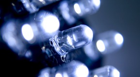 LED, Solid State Lighting. Electronics industry LED lightbulbs in rows. White and blue.